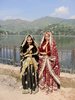 My friend and I dressing up in traditional Kashmiri bridal dresses.....super heavy and hot that day!!! Can you pick me out? lol
