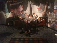 Me sitting with wax figures of my favorite band, 'Ladies and Gentlemen, The Beatles !'