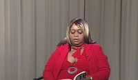 Aura at work on her cable television show in Chicago, Illinois where she talks against sexual assault and domestic violence and poverty! She also has rappers, dancers, poets, actors and private business owners and politicians on her show!
