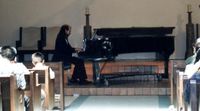 performing one of my piano pieces, July 2001