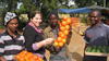 Buying oranges on the road side while traveling in South Africa (July 2010)