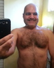 Trying to cover up the difficulty of taking a selfie which shows my hairy chest :-)