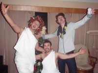 My buds and I this a couple NYE's ago... yes those are togas.   :p